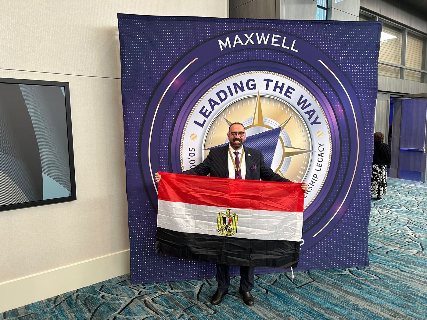 Carrying the Egyptian flag, International Maxwell Conference